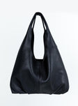 Shoulder bag Faux leather material Twin fixed handles Magnetic button fastening Separate clutch with zip fastening Gold toned hardware
